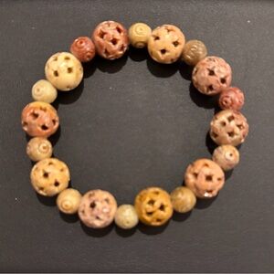 Handcrafted Beige and Peach Carved Bead Stretch Bracelet